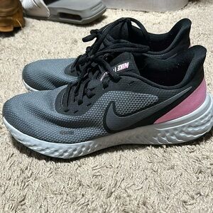 Woman’s Nike revolution running shoes size 9.5